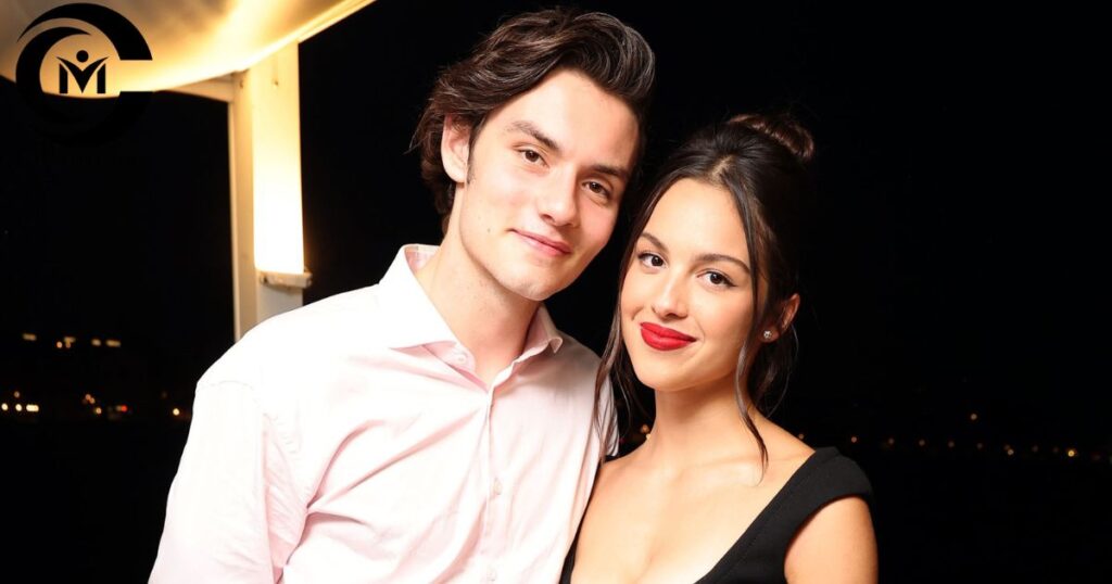Olivia Rodrigo with a male companion at an event